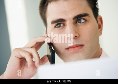 Middle Eastern businessman talking on cell phone Stock Photo