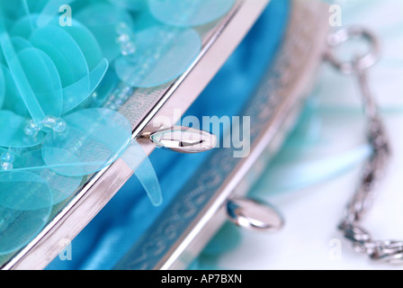 Abstract Close Up of Womens Blue Purse Stock Photo