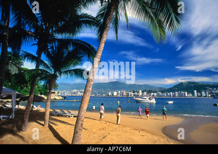 People Playing Soccer on the Beach Acapulco Mexico Stock Photo