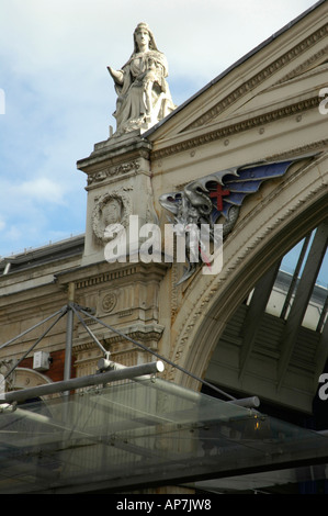 Statue on the roof of Smithfield meat market London UK Stock Photo