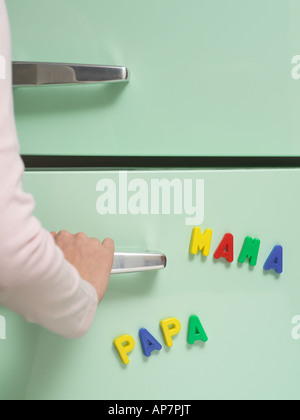 Words written with magnets on refrigerator Stock Photo