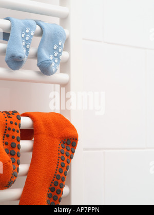 Socks on a radiator Stock Photo