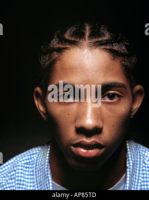 Portrait of young African-American man staring at camera Stock Photo