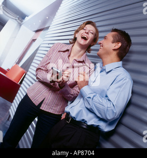 Two employees laughing Stock Photo