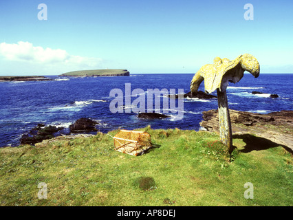dh Whale bone BIRSAY ORKNEY Whale bone creel and Brough of Birsay scotland whalebone skeleton Stock Photo