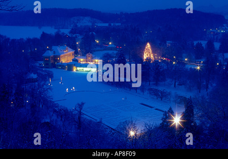 High angle view of village lit up at night Stock Photo