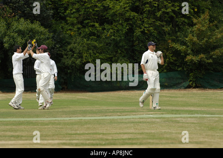 Batsman leaving crease Stock Photo