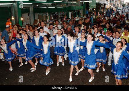 Israel Tel Aviv A group of Israeli folk dancers dancing in the Hatikva market place Stock Photo