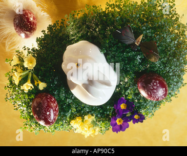 Easter eggs with easter bunny in nest Stock Photo
