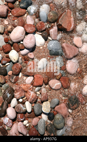 Pebble beach on the Adriatic Sea in Sveti Stefan summer resort Montenegro Stock Photo