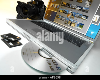 Digital camera with laptop, smartcards and recording media used in digital photography Stock Photo