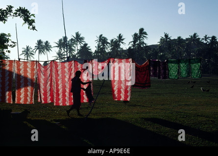 A woman hangs out her laundry Yanuya Island Fiji Stock Photo