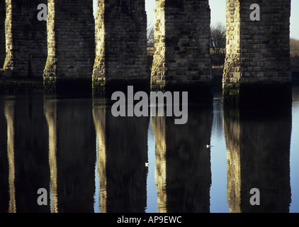 Water reflections from the railway viaduct built by Robert Stevenson at Berwick upon Tweed train station Stock Photo