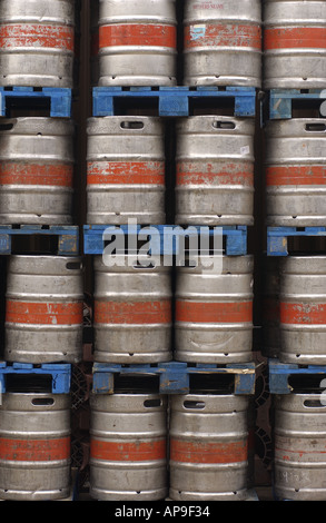 steel Beer barrels stacked on pallets at Youngs Brewery in South west London forming abstract patterns Stock Photo