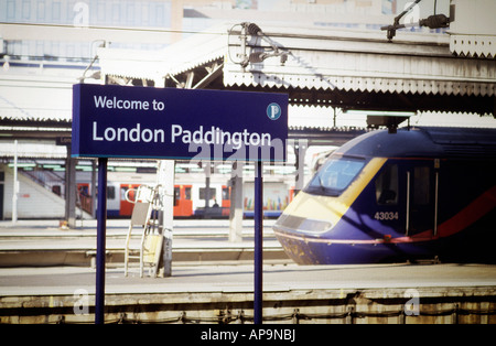 platform sign and train at London Paddington train station Stock Photo