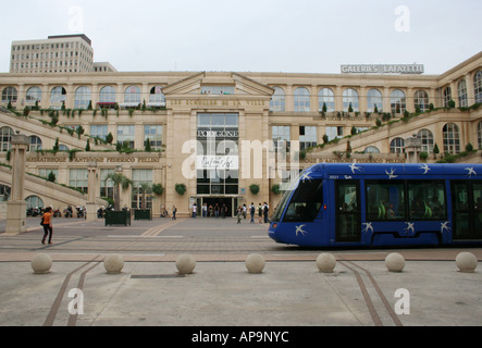 modern trams and Centre Commercial Le Polygone Montpellier France  September 2006 Stock Photo