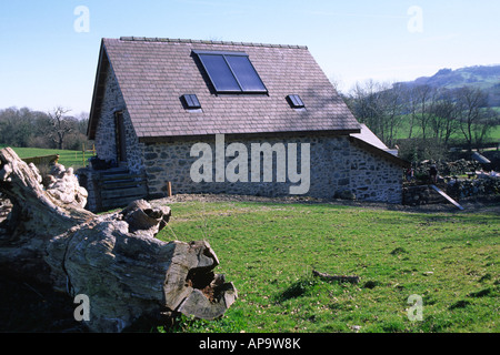 Solar water heating panels on a new barn conversion. Powys, Wales, UK. Stock Photo