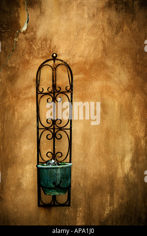 Objects, still life, beautiful flowerpot on rustic cracked wall, backgrounds, colours, plants, gardening, decor, artistic, home decoration Stock Photo