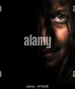 WOMAN IN DARKNESS Stock Photo