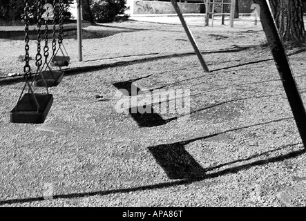 PLAYGROUND EMPTY BLACK 41（25.5-26.0） Empty playground with metal slide for kids on nature