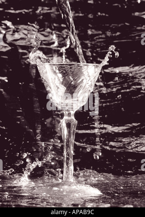 water wine pouring in glass Stock Photo