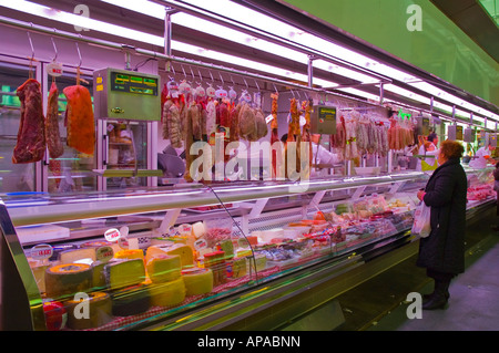 Ham and cheese stall at the market hall in Girona Catalonia Spain EU Stock Photo