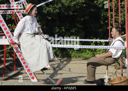 Fairground staff in traditional victorian dress at the Old Town Museum Den Gamle By in Arhus Denmark Stock Photo