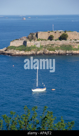 Yacht in front of Castle Cornet, St Peter Port, Guernsey, Channel Islands Stock Photo