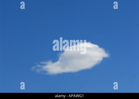 A single cloud in a blue sky Stock Photo