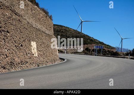 Spain andalusia road and windmills power turbine in the alpujarras mountains near granada Stock Photo