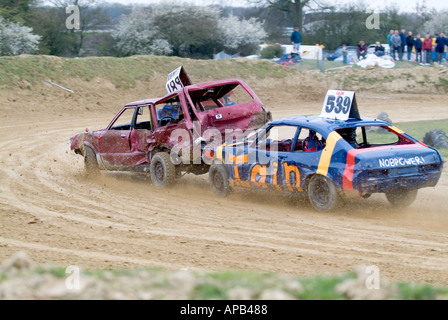 A Ford Capri smashes into a Ford Cortina on a Banger Racing track Stock Photo