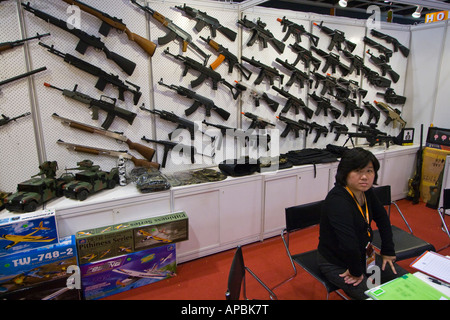 Toy Guns Manufacturer at the Toy and Games Fair Hong Kong Convention and Exhibition Centre Stock Photo