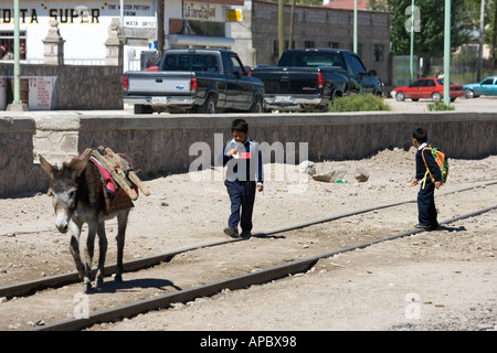 Schoolchildren on their way home after school in Creel Mexico a popular tourist destination in Chihuahua State and gateway to Stock Photo