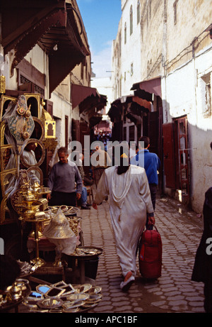 Woman in narrow alley Fez Medina old town Morocco North Africa Stock Photo