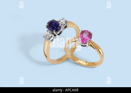 Pink and blue sapphire gold rings Stock Photo