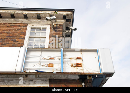 CCTV on abandoned motor dealership Stock Photo