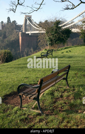 A park bench looking across the Avon Gorge by Brunel's historic Suspension bridge in Clifton Bristol U.K. Stock Photo