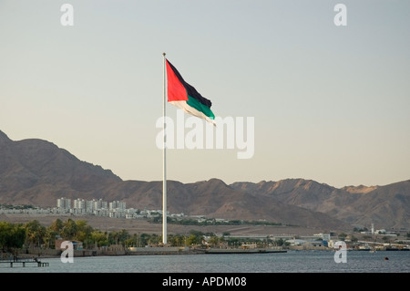 Huge flag flying over the Gulf of Aqaba, Hashemite Kingdom of Jordan, Middle East.  DSC 4798 Stock Photo