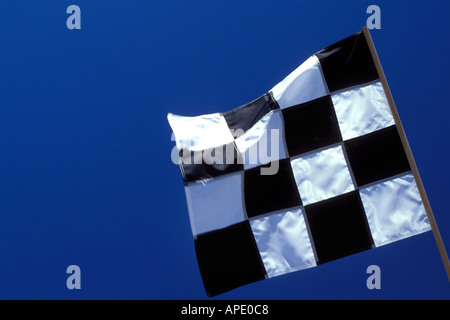 Checker flag winner against sky blue background