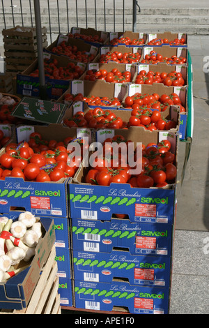 Boxes of red tomatoes stacked at market stall Stock Photo - Alamy