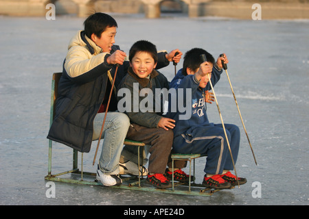 Winter chair skating on the frozen Houhai lake in Beijing Stock Photo