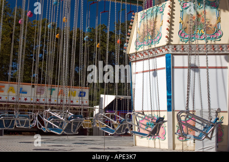 empty seats on a carousel Stock Photo