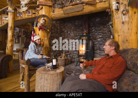 Couple Relaxing At A Ski Lodge Stock Photo 332072205 Alamy