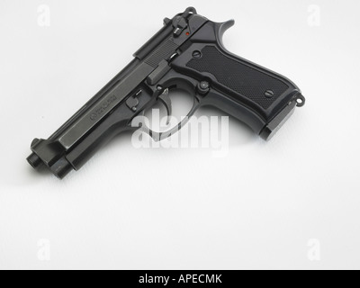 One black handgun on white background Stock Photo