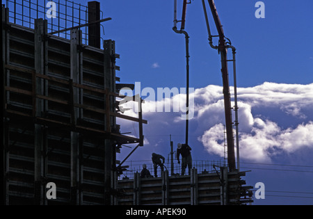 Two workers are silhouetted at a construction site for the Los Angeles  Chargers' headquarters and training facility, Thursday, May 18, 2023, in El  Segundo, Calif. (AP Photo/Jae C. Hong Stock Photo - Alamy