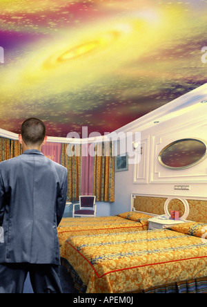 Man in surreal room with open ceiling. Stock Photo