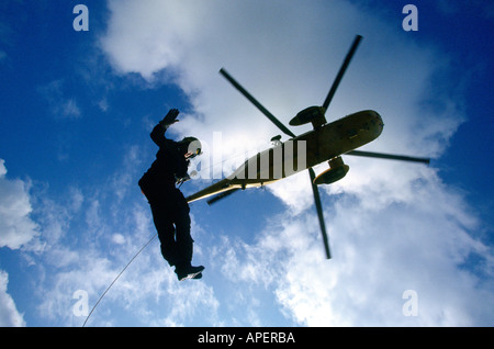 Helicopter rescue winch, RAF man, Cornwall, UK Stock Photo