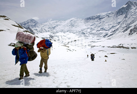 Sherpa porters arriving to Tilicho Lake.  Annapurna circuit trek. Nepal Stock Photo