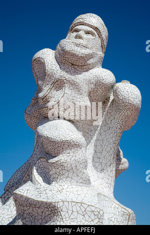 Statue of Captain Scott clad in white mosaic tiles commemorating his final voyage from Cardiff Docks to Antarctica viewed against a clear blue sky Stock Photo