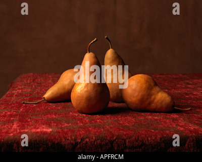 Bosc pear genus Pyrus family Rosaceae still life of pears on a table Stock Photo